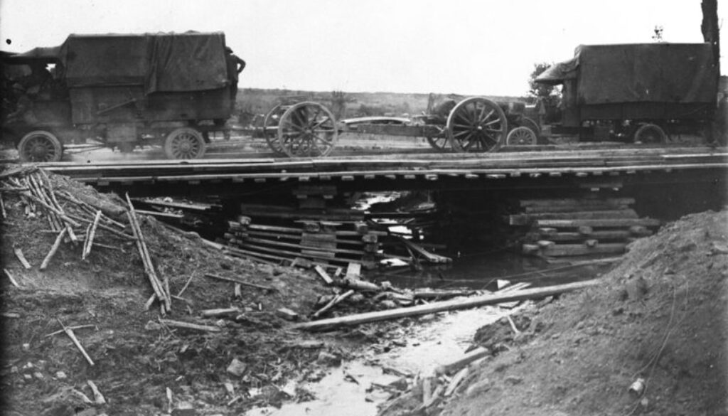 181_Guns going forward over a bridge built by Canadian Engineers. Advance East of Arras. September, 1918